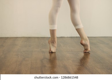 Black And White Wallpaper Faceless Ballet Dancer Warming Up In Studio Copy Space Room For Text. No Face Dancing Female Feet Legs Stretching Indoors Toes Professional Arts. Modern Contemporary Art 