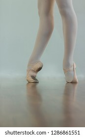 Black And White Wallpaper Faceless Ballet Dancer Warming Up In Studio Copy Space Room For Text. No Face Dancing Female Feet Legs Stretching Indoors Toes Professional Arts. Modern Contemporary Art 