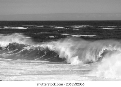 Black And White Of A Wave Breaking Spectacular, Formin A Water Tunnel, Along The Tsitsikamma Coastline Of South Africa.
