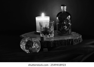 Black and white whiskey, skull bottle and candle - Powered by Shutterstock