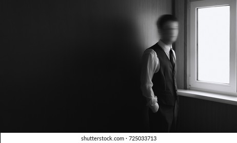 Black And White Of Young Man With Blurred Face