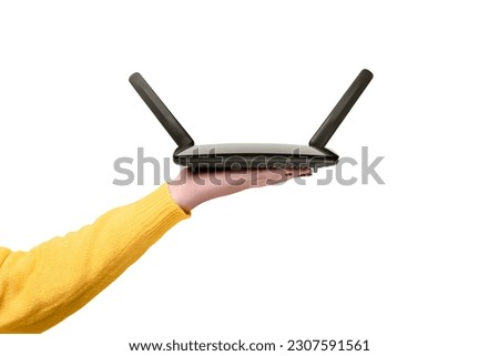 black wifi router on female hand  isolated on  white background