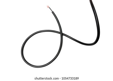 Black wire cable isolated on a white background abstraction. - Shutterstock ID 1054733189