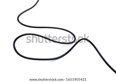 Black wire cable of usb and adapter isolated on white background. Electronic Connector. Selection focus. Electrical wires flexible network, connection industrial power energy cables.