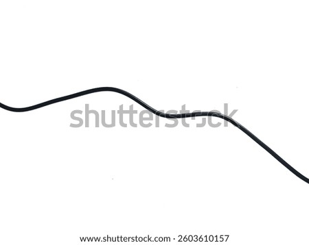 Black wire cable of usb and adapter isolated on white background. Black usb cable is an electronic connector or used for data transfer and charging.