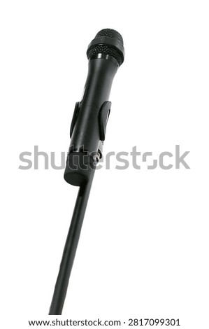 Black wired microphone mounted on a stand against a clean white background. Ideal for presentations, conferences, concerts, podcasts, broadcasting, karaoke and public speaking concepts.