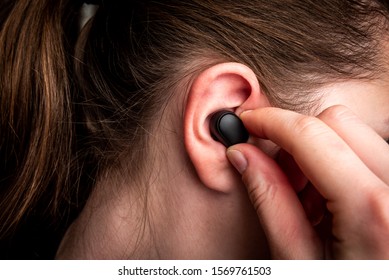 Black Wireless Headphones In Ear.