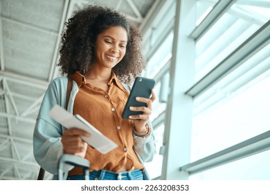 Black woman at airport, travel with smartphone and plane ticket, communication and check social media with smile. Notification, email or chat with technology, ready for flight and happy for adventure - Powered by Shutterstock