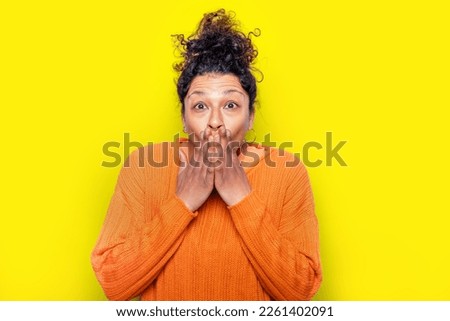 Black woman awe and astonishment face expression isolated on yellow background Foto stock © 