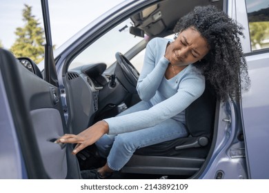 A Black Woman In A Car After A Accident