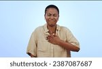 Black woman, chest and sore throat in heart burn or cough isolated against a studio blue background. Sick African female person or model with respiratory infection, disease or inflammation on mockup
