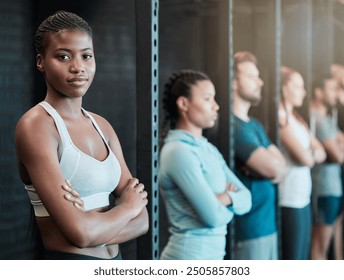 Black woman, confident and portrait for workout, sport or exercise with health, wellness or balance in fitness. Female athlete, arms crossed and pride in gym for training, strong muscle or toned body - Powered by Shutterstock