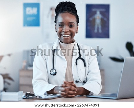 Black woman, doctor in portrait and healthcare, smile in office and laptop, medical professional and happy in career. Female physician, hands and health mindset with cardiologist at clinic and leader