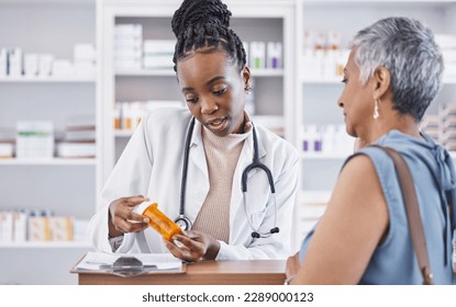 Black woman, doctor and prescription medication for patient or over the counter pills at pharmacy. African medical pharmacist consulting senior client for dosage, symptoms or side effects at clinic - Powered by Shutterstock