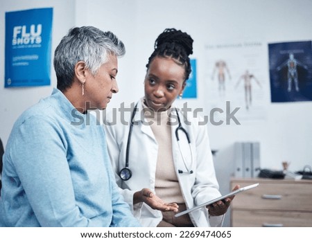 Black woman, doctor and senior patient with tablet, results and listen for health planning, advice or cancer. African medic, mobile touchscreen and healthcare with trust, tech and support in hospital