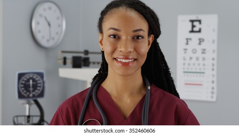 Black Woman Doctor Smiling At Camera