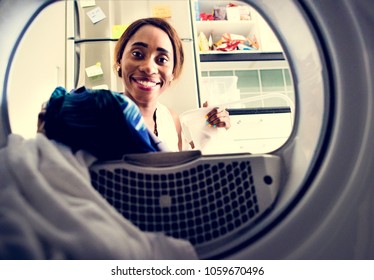 Black Woman Doing The Laundry