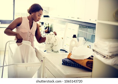 Black Woman Doing The Laundry