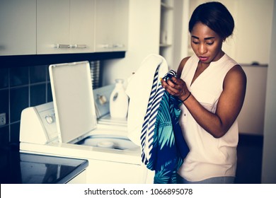 Black Woman Doing The Laundry