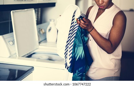 Black Woman Doing The Laundry