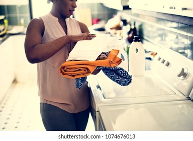 Black Woman Doing The Laundry