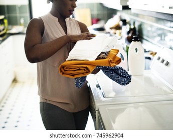 Black Woman Doing The Laundry