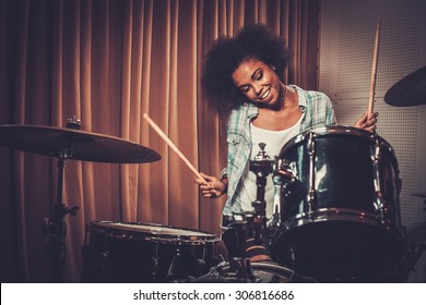 Black Woman Drummer In A Recording Studio 