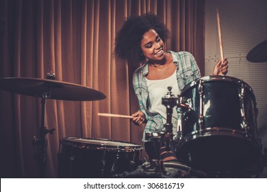 Black Woman Drummer In A Recording Studio 