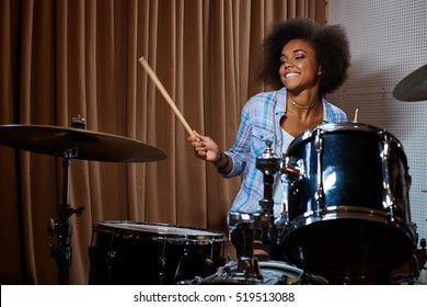 Black Woman Drummer In A Recording Studio