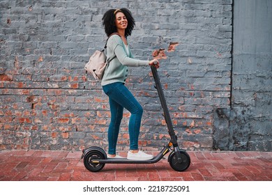 Black Woman, Electric And Scooter In City With Smile, Happy And Relax For Summer Day, Edgy And Trendy On Sidewalk. Yong Female, Girl And Eco Friendly Transportation Have Fun, Cheerful And In Street.