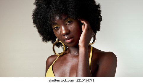 Black Woman, Face And Makeup With Skincare Beauty And Cosmetics Against Grey Backdrop. Model, Hand And Hair, Show Afro, Skin Wellness And Health In Portrait Against Studio Background In Los Angeles