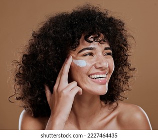 Black woman, facial cream and skincare wellness of happy face skin glow and sunscreen. Cosmetic, collagen and dermatology lotion of a woman model with a smile from natural cosmetics treatment - Shutterstock ID 2227464435