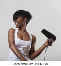 Black Woman With A Hair Dryer