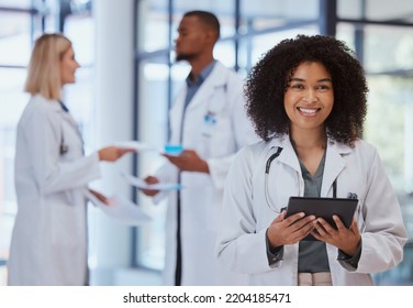 Black woman healthcare doctor with tablet for research in .medical hospital leadership, help and trust. African girl pharmacist with internet digital technology data for medicine analytics results - Powered by Shutterstock