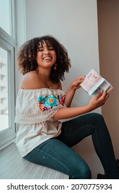 Black Woman Holding Her Passport