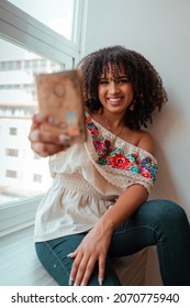 Black Woman Holding Her Passport