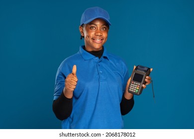 black woman holding a pos device
