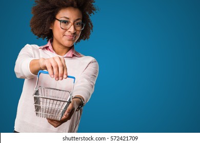 Black Woman Holding Shopping Basket