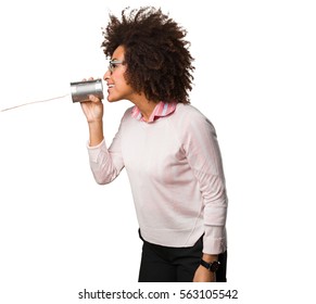 Black Woman Holding A Tin Can