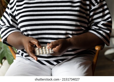 Black Woman Holds Progesterone Pills, Modern Hormone Replacement Therapy For The Treatment Of Menopause And Menopausal Symptoms