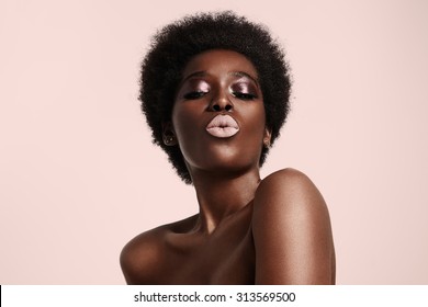 Black Woman With A Light Pink Lips Sending Kiss