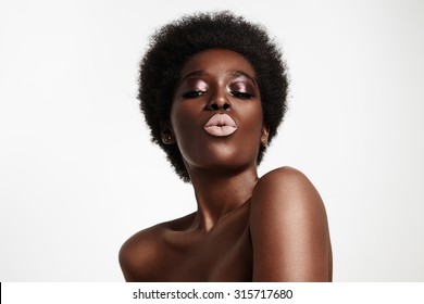 Black Woman With Light Pink Lips Sending Kiss