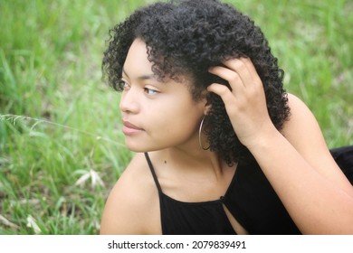 Black woman looking to the side