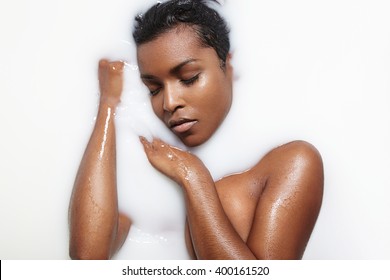 Black Woman In A Milk Bath