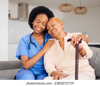 Black woman, nurse and senior patient in elderly care, hug and healthcare on living room sofa at home. Happy African medical professional or caregiver help person with kindness and cane in house - Powered by Shutterstock