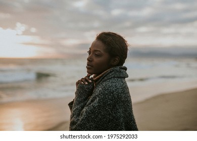 Black Woman On The Beach At Sunset