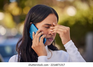 Black woman, phone call and stress, worry or sad, communication and reaction to bad news, conversation on smartphone and outdoor. African American person, headache and serious, upset and concern. - Powered by Shutterstock