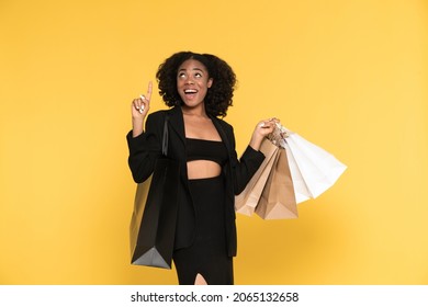 Black Woman Pointing Fingers Upward While Stock Photo 2065132658 ...