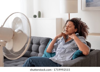 300 Woman cooling off with fan Images, Stock Photos & Vectors ...