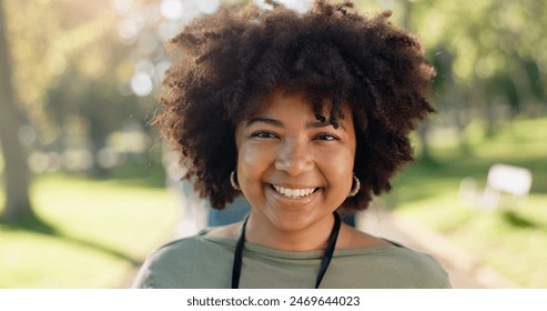 Black woman, portrait and happy in park for charity, volunteer and community service work with donation. African person, smile and eco friendly outdoor for change, project or sustainability with NGO - Powered by Shutterstock